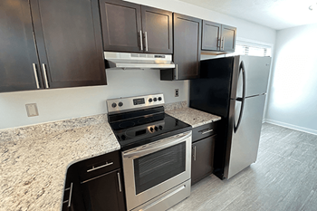 Electric range with self cleaning oven